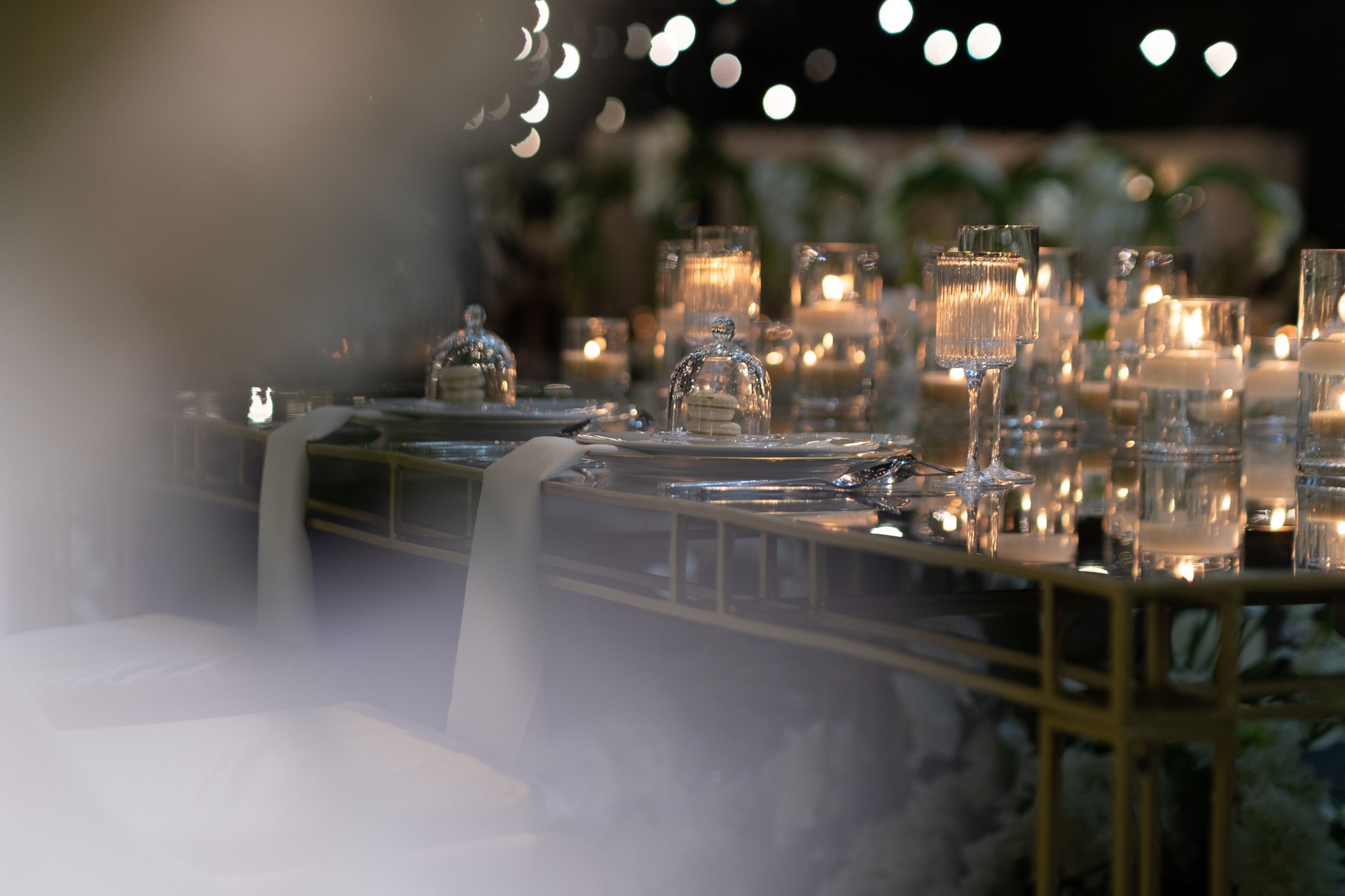 Beautiful Candlelit table setting at wedding reception